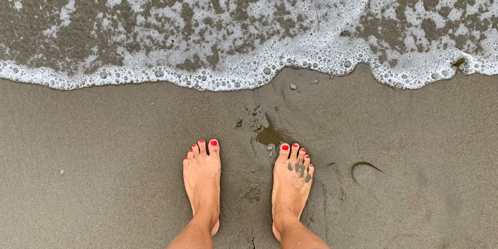 Bare feet at the beach